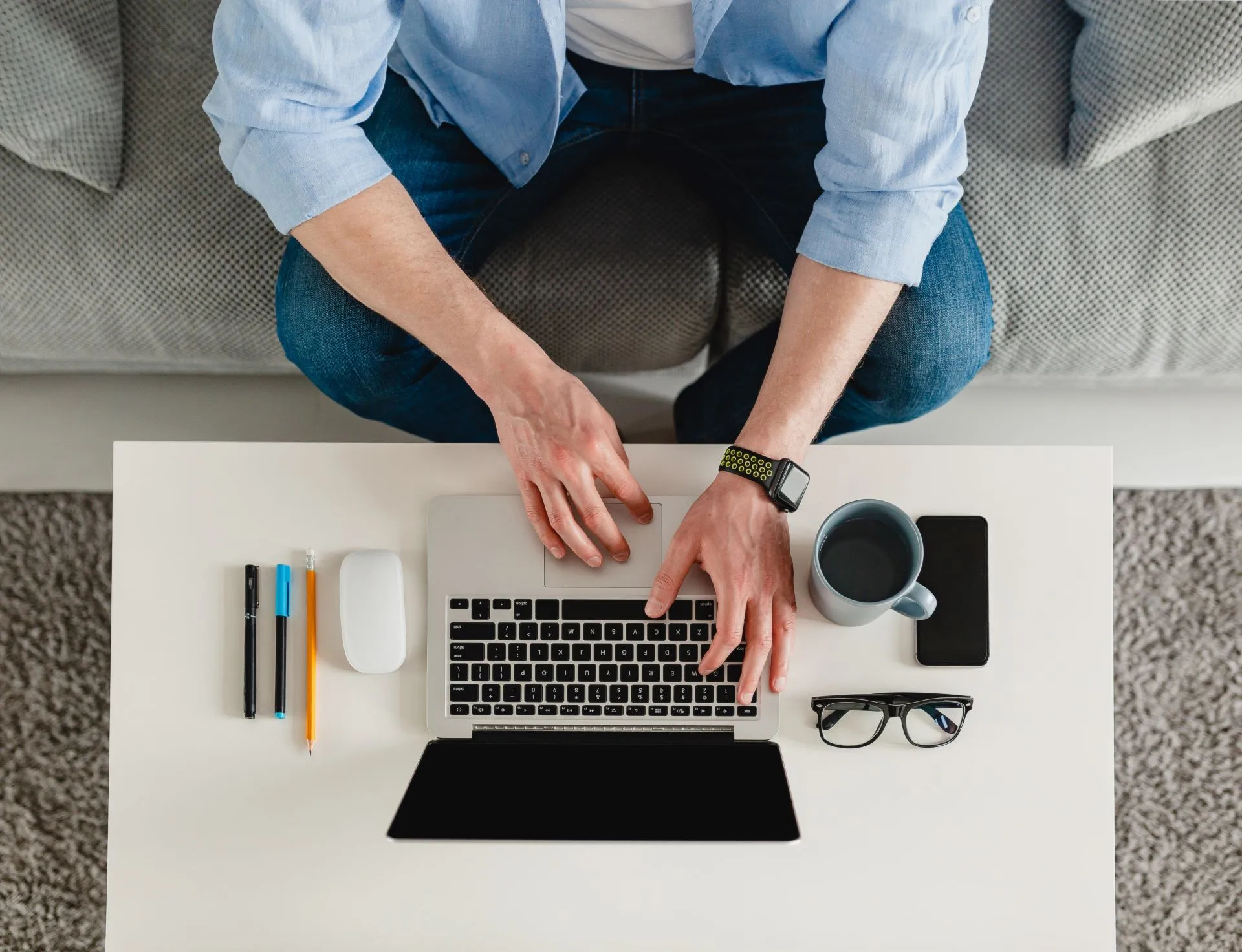 table-workplace-close-up-man-hands-home-working-typing-laptop